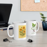 Two mugs on a desk with one featuring a GGN logo.