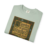 Folded light green t-shirt with a graphic design featuring Gertrude Jekyll text and illustrations on a white background