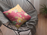 Decorative pillow with floral pattern red and yellow
