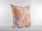 Floral-patterned orange pillow on a light gray background