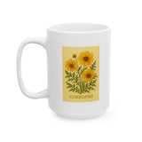 White mug with yellow coreopsis flower design and 'COREOPSIS' text on a white background