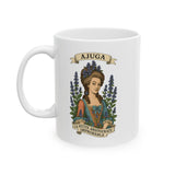White mug with a design of a woman surrounded by flowers and text on a white background