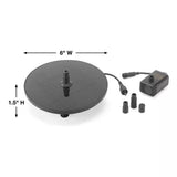 Black circular pump with dimensions labeled on a white background