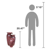 Outdoor Garden Patio 3-Tier Burgundy Red Ceramic-Look Polyresin Water Fountain next to a human figure with height and width measurements on a white background