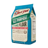 Bag of Bob's Red Mill organic all-purpose flour on a white background