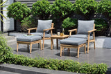 Outdoor furniture set with wooden frames and gray cushions on a patio.
