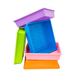 Stack of colorful plastic trays in purple, blue, green, pink, and orange on a white background. 1010 Trays 2.5" Deep - Extra Strength