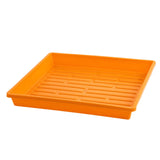 Orange plastic tray with textured surface on a white background 1010 Shallow Seed Trays