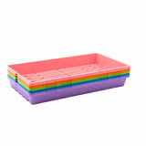 Stack of colorful plastic trays on a white background