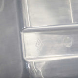 Close-up of 1020 EXTRA STRENGTH HUMIDITY DOMESwith recycling symbols on a gray background