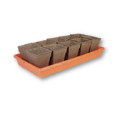 Seed starting trays with brown peat pots on an orange tray against a white background CowPots® #4 Square