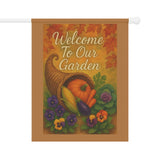 Decorative garden flag with cornucopia, pumpkins, and autumn leaves on a white background