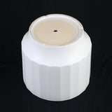 3-Piece White Stoneware Planter Set with Fluted Design on a black background