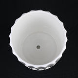 White ceramic planter with decorative edge on a black background 3-Piece White Ceramic Planter Pot Set with Fluted Design & Saucers