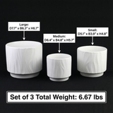 Three white marble-textured planters of different sizes with measurements and weight information on a black background3-Piece White Stoneware Planter Pot Set with Embossed Texture 