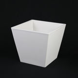 White square planter on a black background
