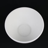 White bowl on a black background