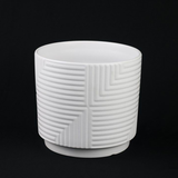 White ceramic planter with geometric pattern on a black background 3-Piece White Stoneware Planter Set with Geometric Line Design