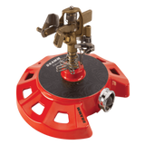 Red and brass sprinkler on a white background