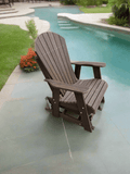 Brown Adirondack chair by a poolside