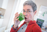 Person smelling CRISP APPLE SOAP SLICE 5.5 oz.