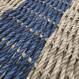 Close-up of woven blue and beige mat