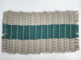 Woven mat with gray and teal stripes on a white background