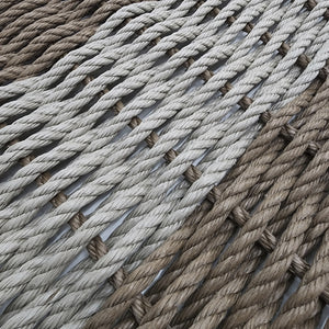 Close-up of braided rope in brown and gray colors.