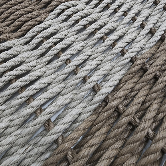 Close-up of braided rope in brown and gray colors.