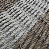 Close-up of braided rope in brown and gray colors.