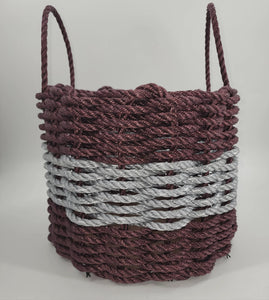 Rope basket with two-tone design on a white background