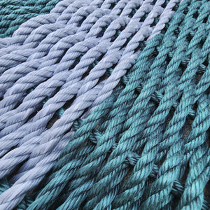 Close-up of blue and gray ropes