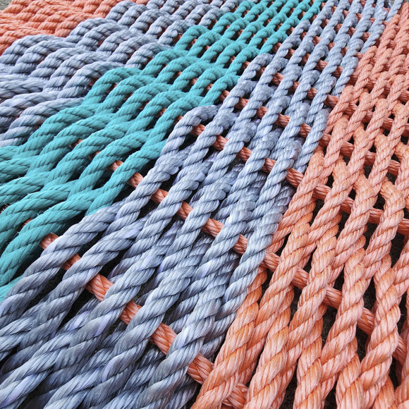 Close-up of multicolored ropes arranged in a pattern