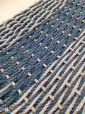 Close-up of blue and beige woven fabric pattern