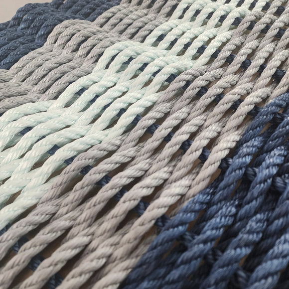 Close-up of braided rope in various colors.