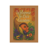 Decorative sign with cornucopia, pumpkins, and flowers on a brown border with 'Welcome To Our Garden' text.