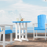 Outdoor furniture set with blue and white chairs and table on a wooden deck.