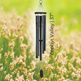Whispers in the Wind Series Wind Chime with 'Zephyr Valley' text against a blurred natural background