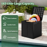 Black storage box with patio cushions, garden tools, sports equipment, and pool supplies on a patio.