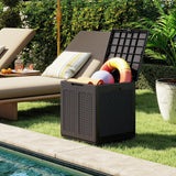 Black storage box with pool toys next to a lounge chair by a pool