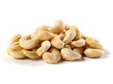 Pile of cashews on a white background