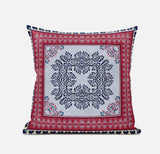 Decorative pillow with a red border and central pattern on a white background
