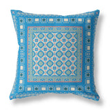 Decorative pillow with blue geometric pattern on a white background