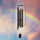 Biblical Bells Series Wind Chime with 'Victory Bells of Jericho' text against a colorful sky background