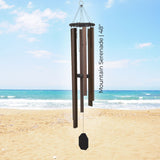 Pacific Winds Series Wind Chime on a beach with ocean view