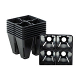 Stack of black plastic seedling trays on a white background 4 Cell Plug Tray Inserts