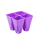Purple plastic container with multiple compartments on a white background 4 Cell Plug Tray Insert