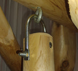 Wooden post with metal hook and clamp