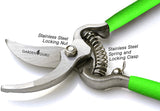 Garden pruner with green handles on a white background