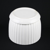 White Ceramic Planter Pot with Vertical Fluted Design & Matching Saucers on a black background